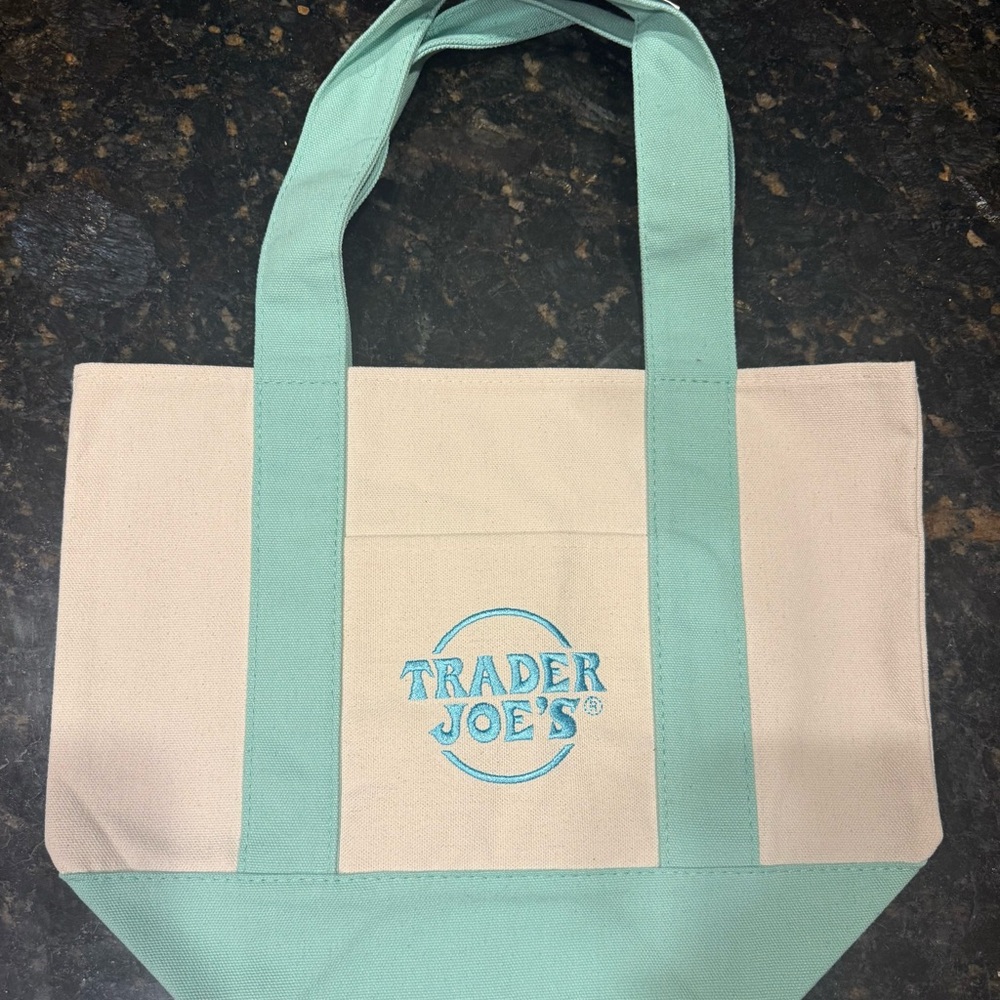 Mint Green and Cream Trader Joe’s Tote Bag with blue
embroidery